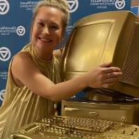 Alum hugging the medical sonography computer.